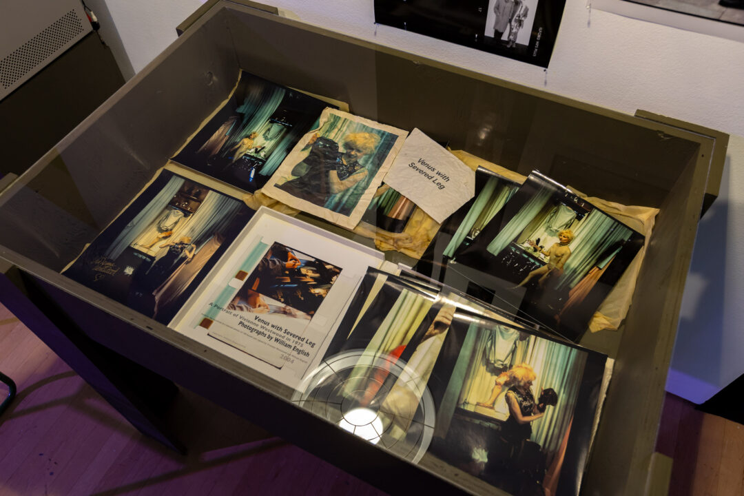 Vitrine showing photographs from William English, Venus With Severed Leg series (1975)