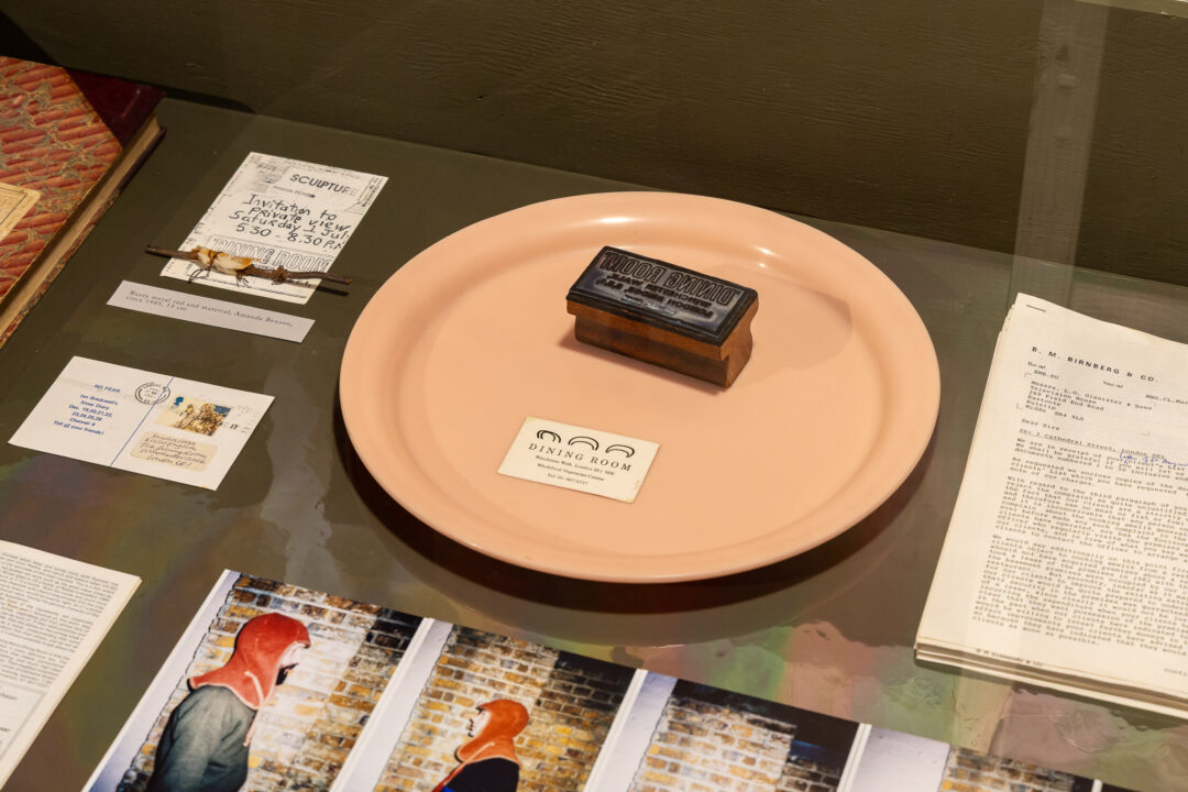 Vitrine showing materials related to the Dining Room restaurant (1980-1990)